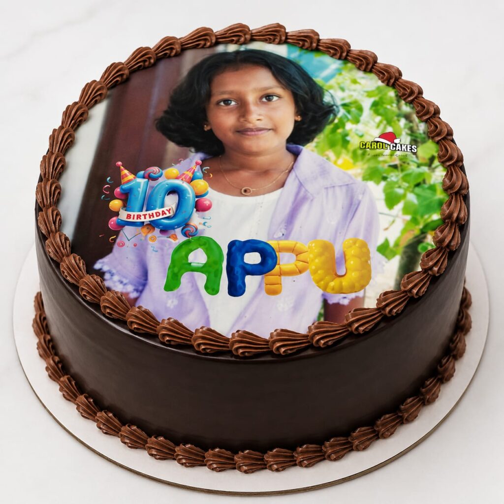 chocolate photo cake by Carol Cakes & cafe Mararikulam