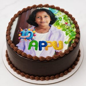 chocolate photo cake by Carol Cakes & cafe Mararikulam