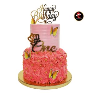 pink butterfly two tier birthday cake from Carol Cakes & Cafe Mararikulam
