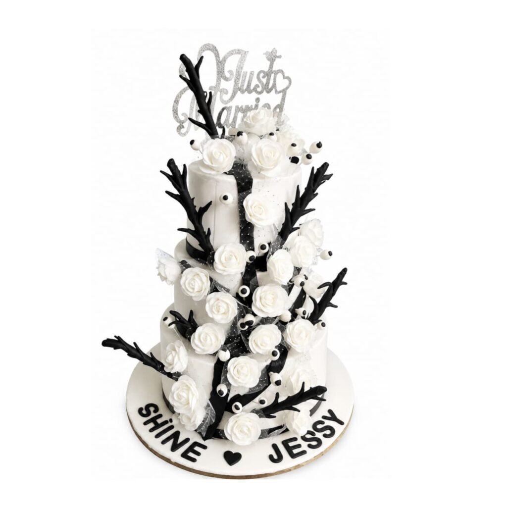 wedding cake by carol cakes & cafe mararikulam
